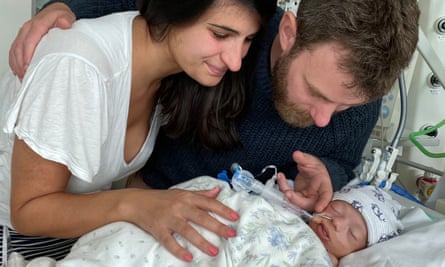 Naomi and Alexander Moris-Patto with William shortly after his birth