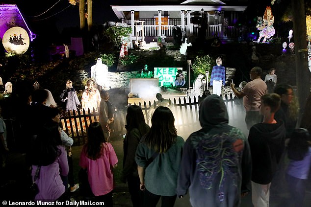 Local children were lured by a chilling zombie invasion in Hackensack, New Jersey, where a creative resident has transformed their lawn into a scene straight out of a horror movie.