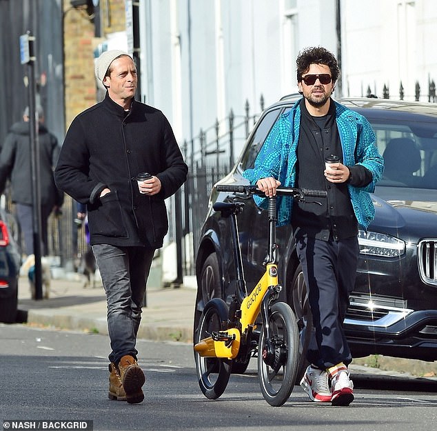 Reunited!  Dominic Cooper, (right) and Stephen Campbell Moore cut relaxed figures as they went for a walk in north London on Monday, 17 years after they starred together in The History Boys