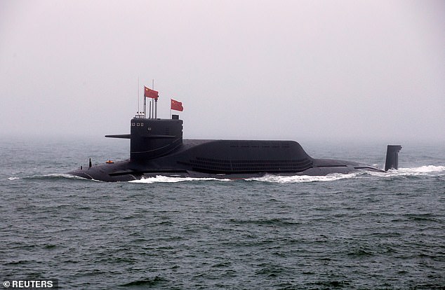 Illustrative photo shows the Long, a nuclear submarine, during a naval parade in 2019. 55 people reportedly died after a Chinese nuclear submarine became trapped in the Yellow Sea