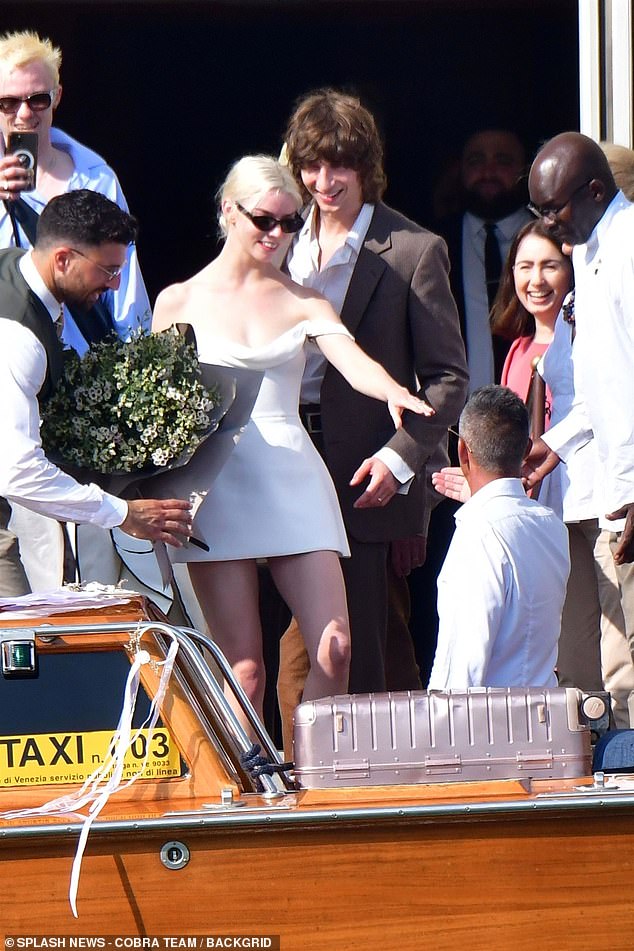 There they are!  Anya Taylor-Joy and her new husband Malcolm McRae got hot and heavy on a boat the day after they got married in a lavish ceremony held in Venice last weekend