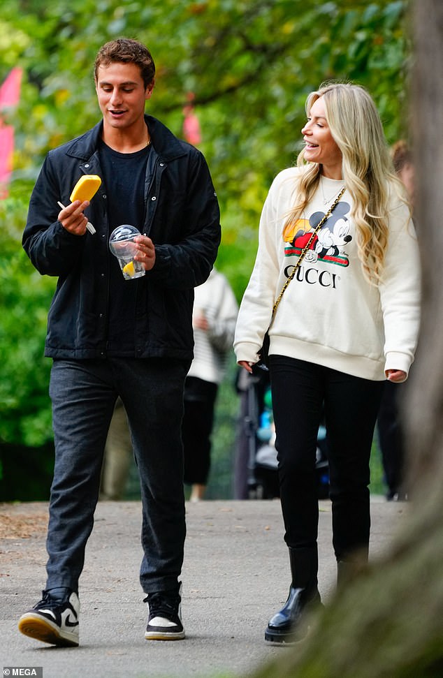 Crystal Hefner, 37, has 'fun' with 23-year-old aspiring tennis pro Alex Kotzen, pictured together in Central Park on October 15