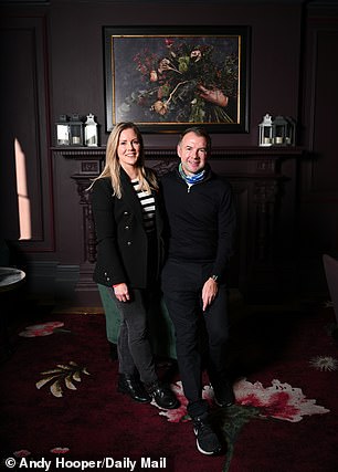 Stewart with his wife Louise (pictured left next to her husband)