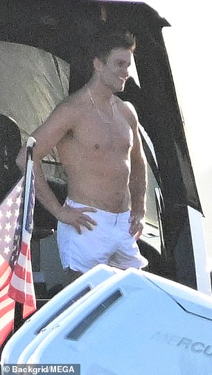 Shirtless Brady spotted on a boat off the coast of Miami