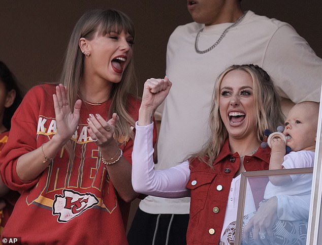 Taylor and her new friend Brittany were seen giggling and hugging throughout the game