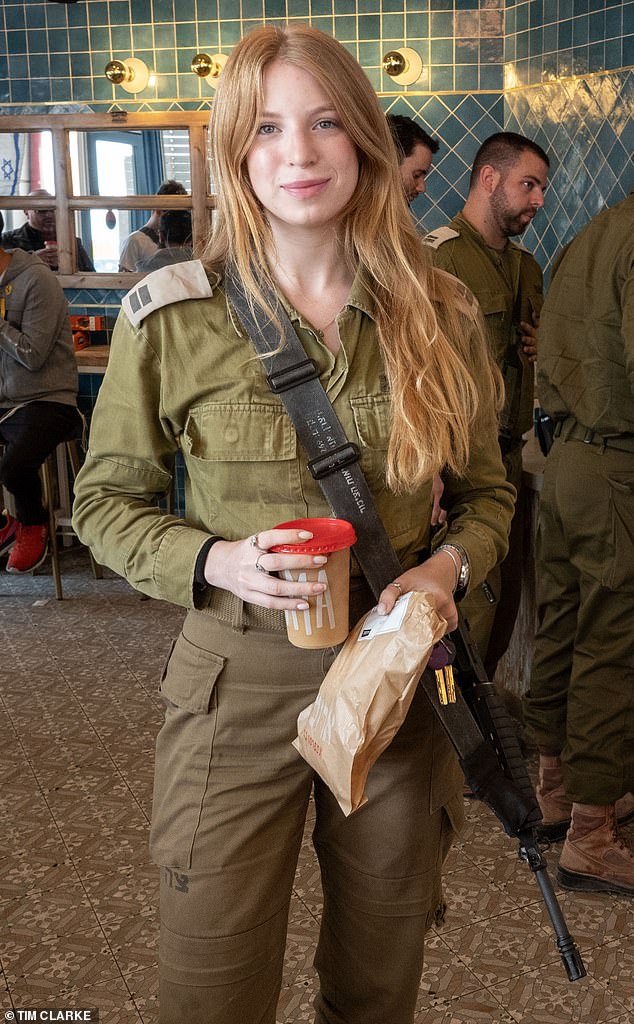 Tamar, 22, from Tel Aviv, normally a flight attendant for Israeli airline El Al – now she's ready to fight Hamas in Gaza