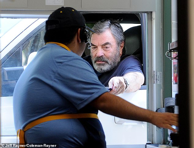 Exclusive DailyMail.com photos show the actor stopping by a McDonald's drive-thru in the San Fernando Valley while running errands in his pickup truck