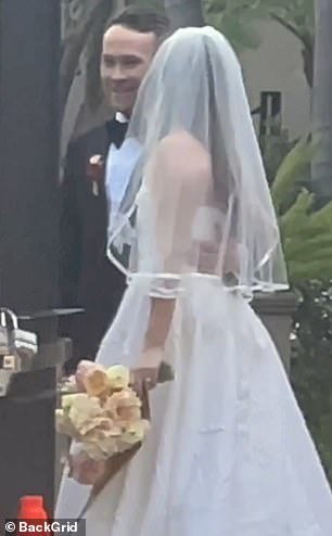 DailyMail.com captured exclusive photos of the happy couple taking pictures outside the ceremony