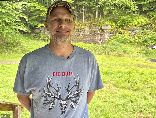 Eric McCarthy (pictured), 45, and Don Reichel, 73, said they heard clattering early in the morning and saw heavily loaded trucks in the remote woods of Elk County, Pennsylvania