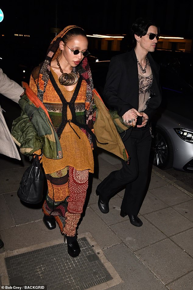 Couple: FKA twigs made a rare appearance with boyfriend Jordan Hemingway at the Jimmy Choo & Jean Paul Gaultier dinner at London's private members' club The Twenty Two on Tuesday