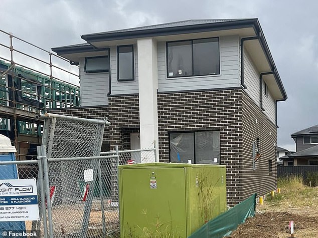 Their once perfect home is now 'ruined' after a large green transformer box was installed right next to their front windows