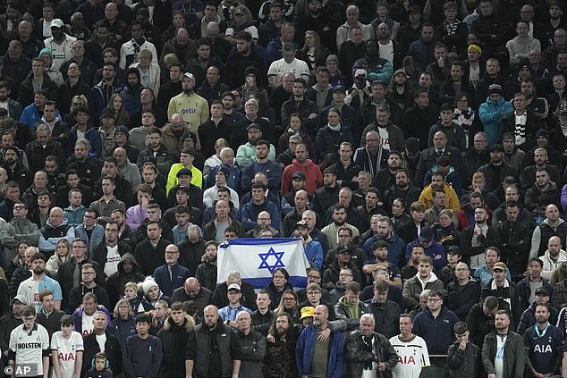 Fans wave Israel flag during Tottenhams Premier League clash against