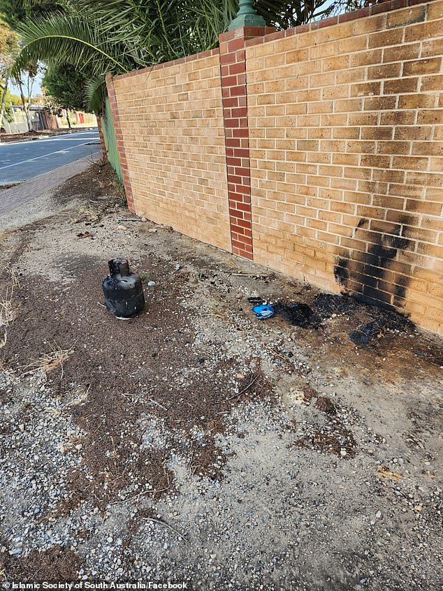 A gas cylinder was set on fire outside the Al-Khalil Mosque in Adelaide's northwest about 2am on Monday (pictured) and four days earlier a fire was deliberately set outside the Marion Mosque in the city's south (below)