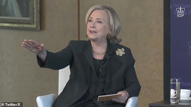 Hillary Clinton is seen Monday night telling Robert Castle to sit down and stop interrupting her event