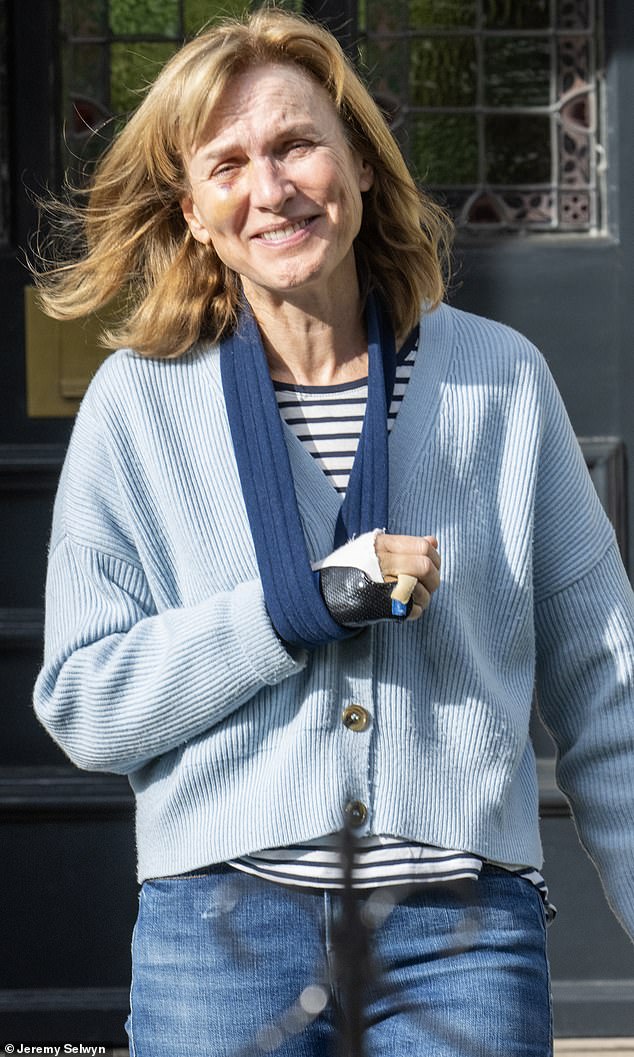 Smiling: Fiona Bruce looked in good spirits on Friday as she stepped out after revealing her injuries following a recent horse riding accident