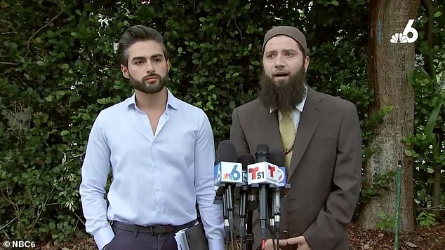 Dr.  Ahmed ElKoussa (left) and his lawyer, Hassan Shiably (right), both spoke in defense of a video that showed the dentist tearing off a poster of missing Israeli children, claiming it was 