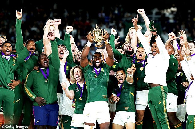 South Africa's Siya Kolisi wins the Web Ellis Cup after his team's victory against England in the 2019 Rugby World Cup final