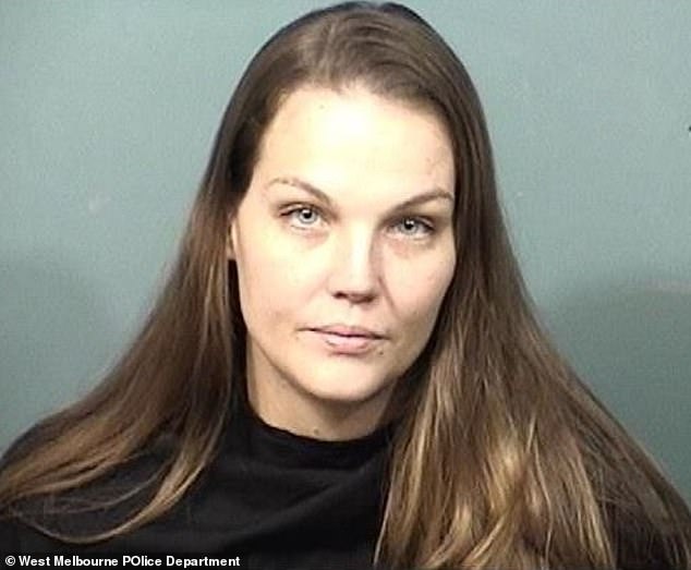 Jamie Leigh Gunn, 33, was charged with child neglect after a police officer spotted her two children sleeping in the backseat of a black SUV parked on Minton Road, Florida