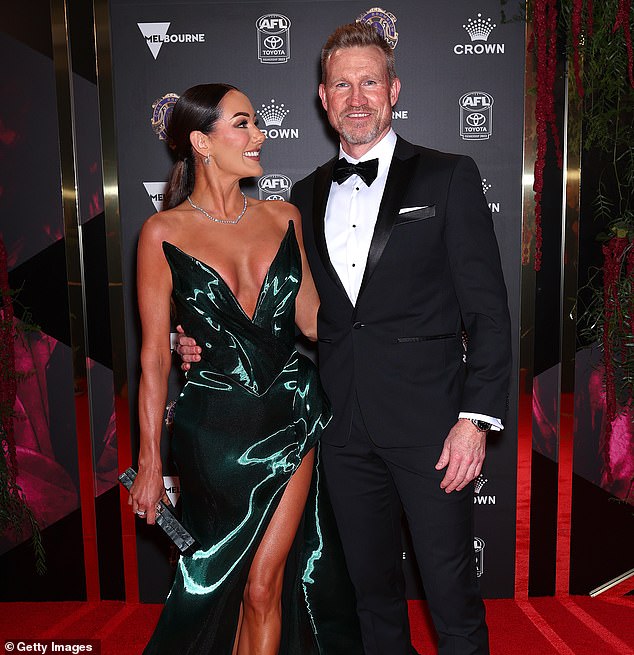 Nathan Buckley (pictured with partner Brodie Ryan at this year's Brownlow Medal ceremony) said he believes the yes vote is the only way forward