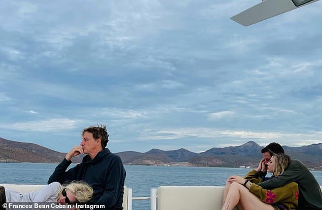 Packing on PDA: Frances could be seen cuddling with Riley while vacationing on a lake with his dad Tony and wife Catherine Goodman in February 2022