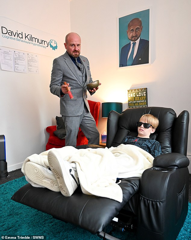 His mother, Heidi, was so desperate for help that she contacted a hypnotherapist who specialized in healing obsessive eating disorders.  After just a handful of intensive treatment sessions, his diet now includes ten new foods.  In the photo Rocco with hypotherapist David Kilmurry