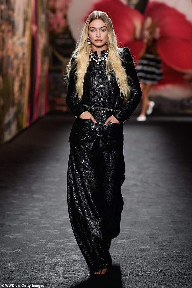 Back in black: Hadid walks the Chanel Ready To Wear Spring 2024 catwalk in Paris on Wednesday