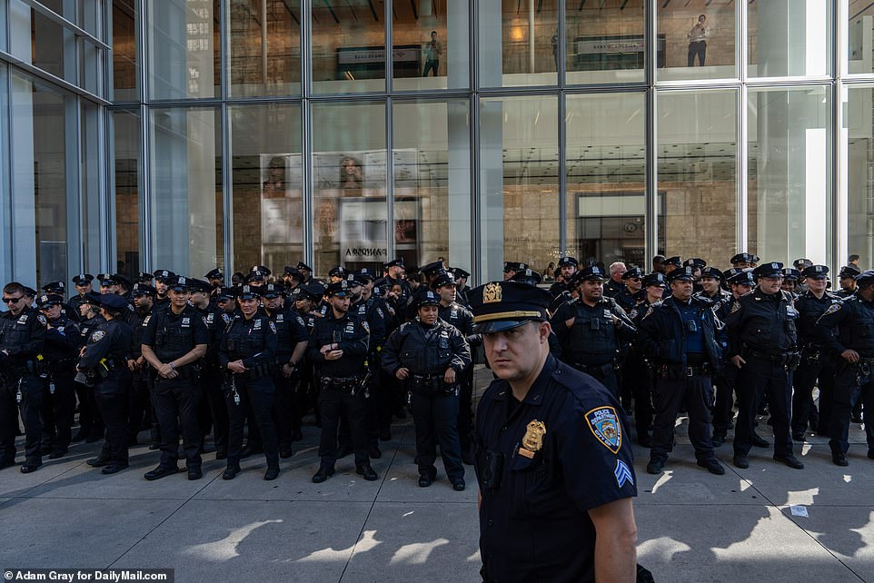 NYPD officers gather on 42nd Street for a briefing ahead of planned pro-Palestine protests, Manhattan