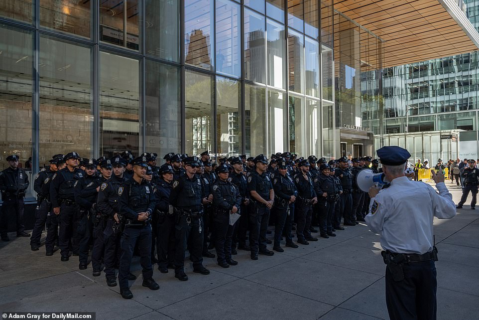 Dozens of NYPD officers listen to a briefing ahead of a planned pro-Palestine protest in Times Square