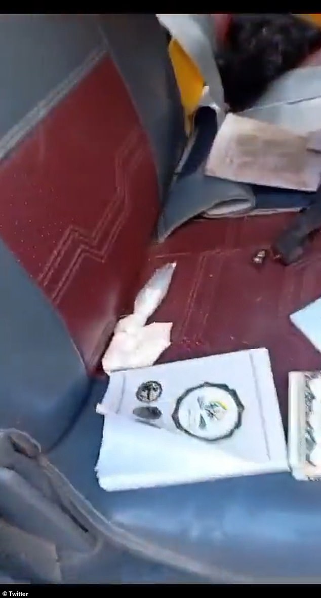 A small bag filled with white powder is visible on the seat of the Hamas-linked car in the clip