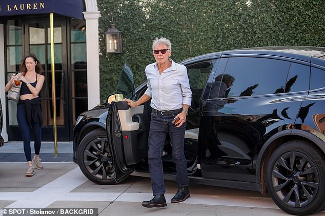 The Oscar-nominated actor was pictured getting out of a black vehicle as he parked the black sports car near the entrance to the luxury outfit