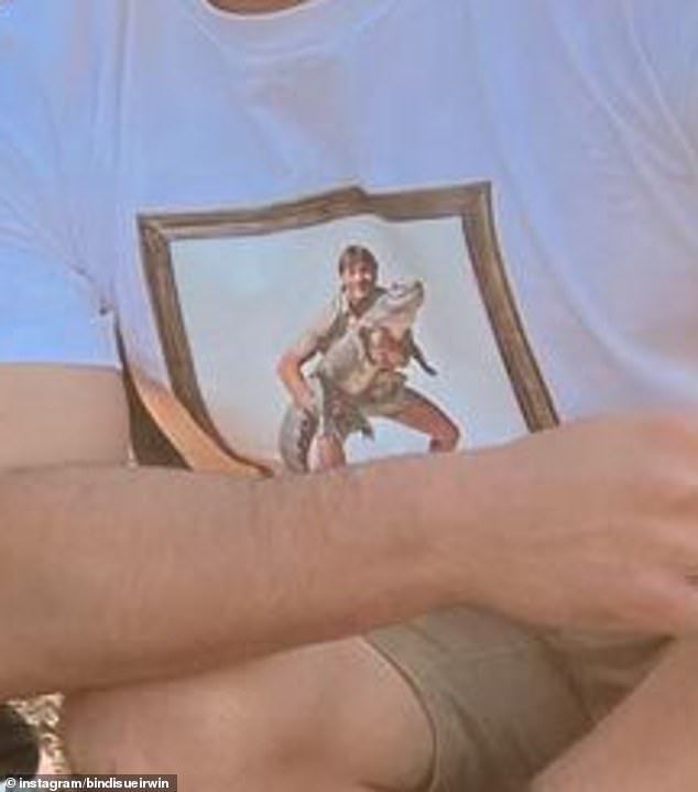 Eagle-eyed fans spotted Bindi's husband Chandler, 26, wearing a T-shirt featuring his late father-in-law Steve Irwin on the front