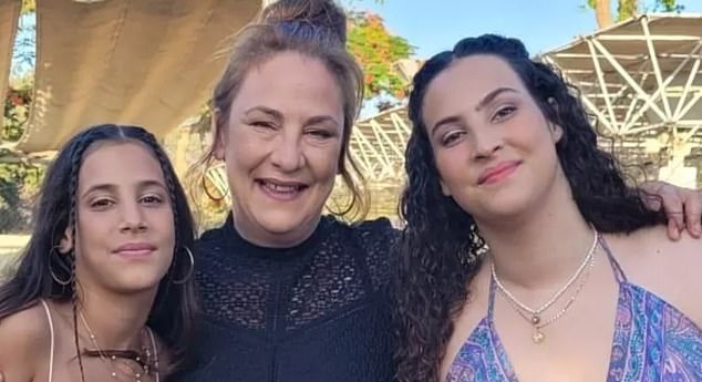 Hamas has shot or captured residents of the 1,000-strong Be'eri kibbutz, including British mother Lianne Sharabi (center) and her daughters Yahel (left), 13, and Noiya (right), 16