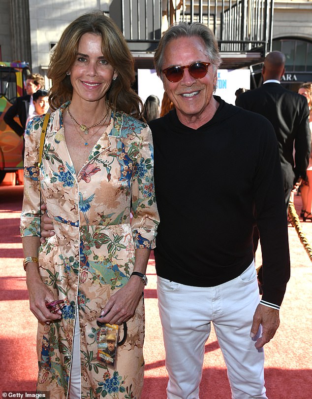 His father is actor Don Johnson, 74;  seen with former school teacher Kelley Phleger, 54, in 2019