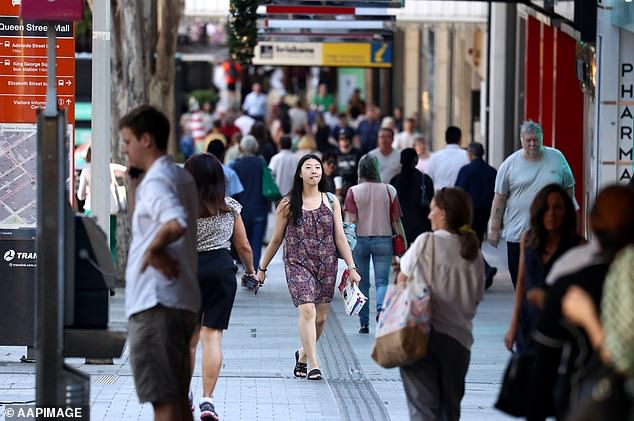 Australians face a $1,500 fine for failing to file their tax returns on time - after Labor stopped getting $1,500 back in tax credits for low and middle income earners (pictured is Brisbane's Queen Street Mall)