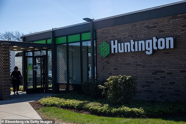 Huntington Bank has filed applications to close 26 physical locations in the Midwest.  Pictured is a Huntington Bank branch in Troy, Michigan