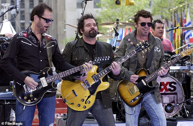 Happy Days: INXS reunited earlier this week for the first time since 2017 (Kirk Pengilly, ANDrew Farriss, Tim Farriss and Jon Farriss pictured in 2006)