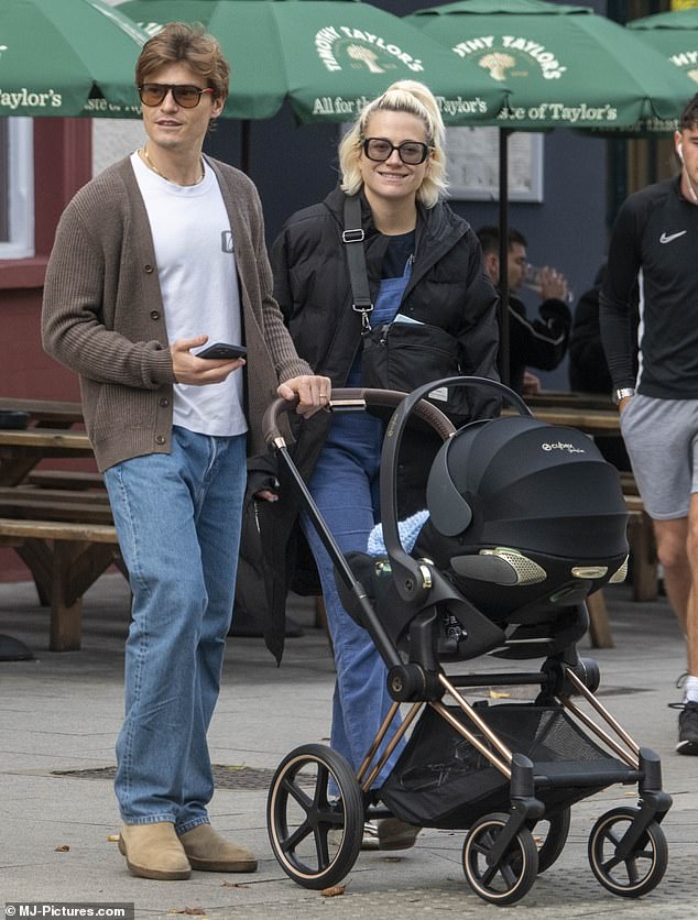 Congratulations!  Pixie Lott and Oliver Cheshire welcomed their first child together and were spotted with the baby for the first time on Friday