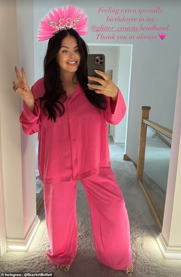 Party in pink: Wearing a pink feather headband and cozy fuchsia pyjamas, Scarlett Moffatt celebrated her first birthday as a mum as she turned 33 today