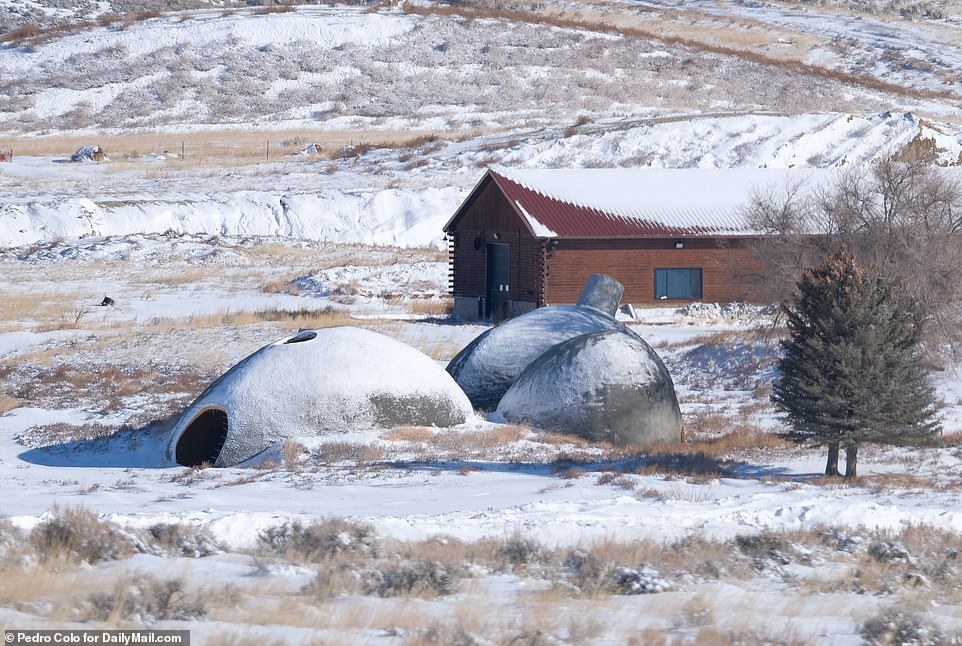 In new images from March 2023, West appears to be building his Wyoming domes out of concrete-like material, which caused the structures to remain standing on the abandoned farm when DailyMail.com visited the scene.