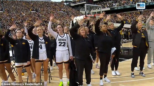 The players participated in the football team's tradition of saluting the hospital after the first quarter.