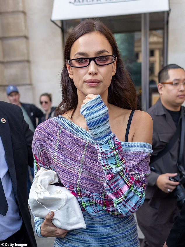 The Latest: Irina Shayk, 37, is upset over rumors of a romance between her ex Bradley Cooper, 48, and fellow supermodel Gigi Hadid, 28. Pictured in Paris last month