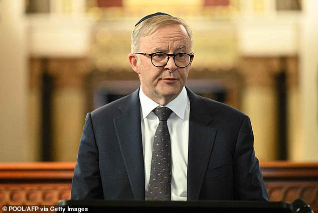 Prime Minister Anthony Albanese wore a Kippah (pictured) as he spoke at a synagogue in Melbourne's St Kilda on Tuesday night, pledging support for the war-torn nation