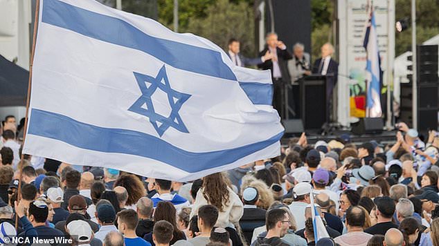 More than 9,000 people have attended a vigil in Sydney (pictured) in support of Israel following the weekend's shocking attack on Israel by the Palestinian militant group Hamas.