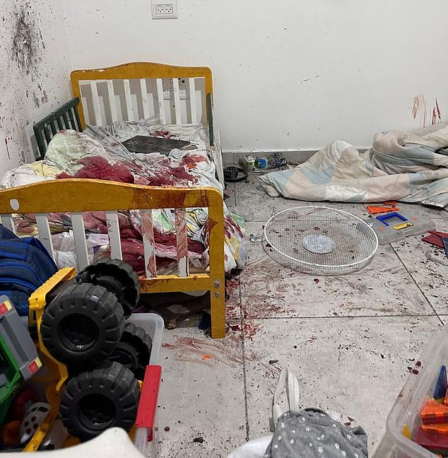 An Israel Defense Forces source provided a photo of a child's blood-soaked bed at Kibbutz Kerem Shalom after a Hamas-led attack on the home