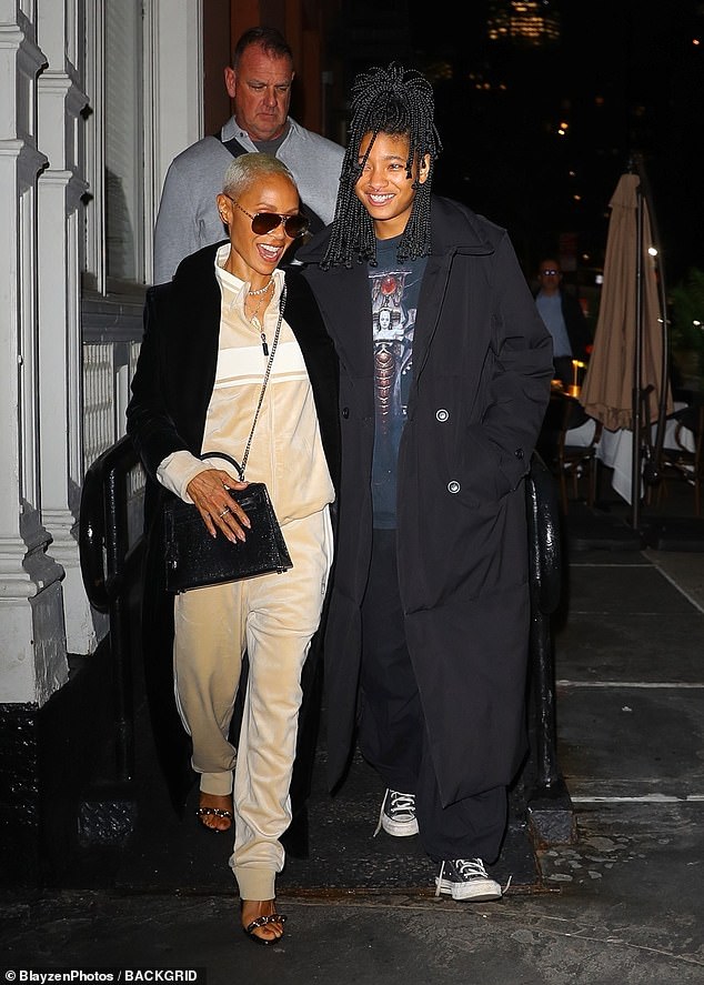 Mother and daughter dinner: Jada Pinkett Smith, 52, stayed cozy while dining out with daughter Willow, 22, at Il Mulino Prime steakhouse in New York on Tuesday