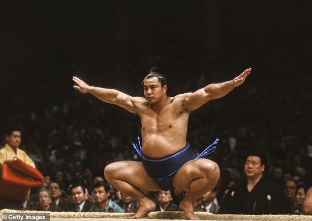 Illustrative image shows Chiyonofuji Mitsugu, a sumo wrestler, during a tournament at the Fukuoka Kokusai Center in Fukuoka, Japan, in November 1983