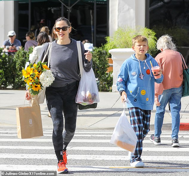 Quality time with her youngest child!  Jennifer Garner and her 11-year-old son Samuel Affleck stocked up on fresh flowers and produce Sunday at a farmers market not far from her $17.6 million Pacific Palisades home