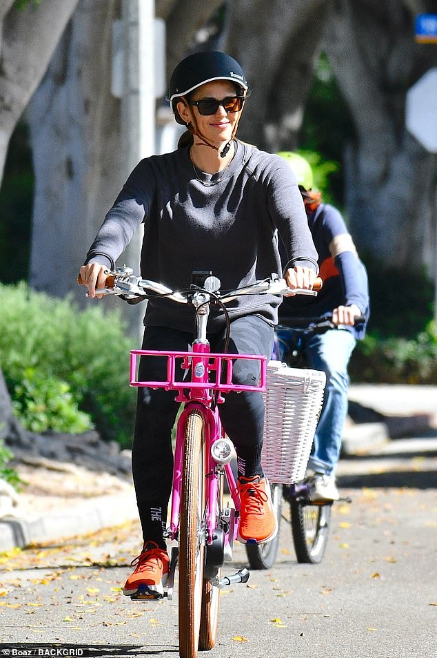 Out and about: Jennifer Garner appeared to be in good spirits on Tuesday as she enjoyed a bike ride with her teenage daughter Seraphina in Los Angeles