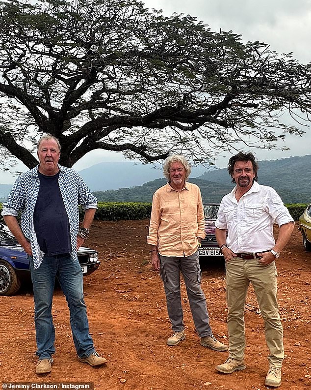 Drama!  Jeremy Clarkson, 63, (left) revealed he is stranded in Botswana along with Richard Hammond, 53, (right) and James May, 60, (centre) after flight delays on Tuesday - as he boasts he has to make do with 40 staff in luxury camp with swimming pool