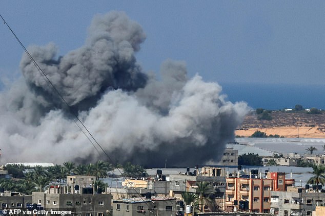 European governments have warned nations to take all necessary measures to prevent war.  Pictured: Smoke rises after an Israeli airstrike in Rafah in the southern Gaza Strip